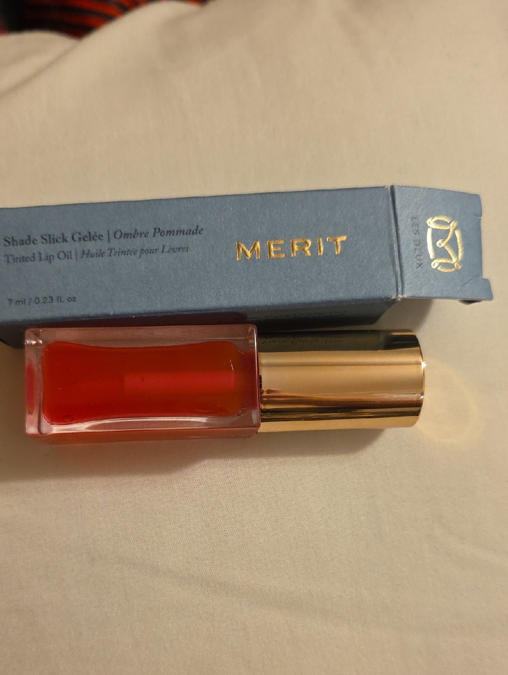 Merit Shade Slick Gelée Tinted Lip Oil in Red-Orange